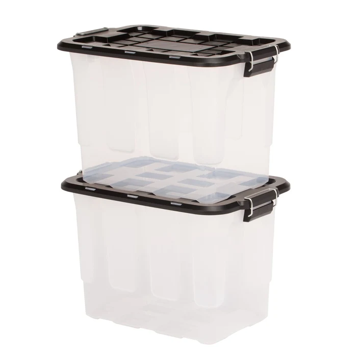 Two clear storage bins with black lids stacked on top of each other